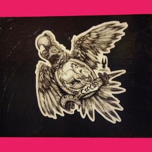 Greg Crayola limited edition sticker sealed on wood